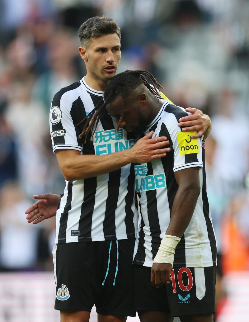 Newcastle United's Fabian Schar and Allan Saint-Maximin react after the 3-3 draw with Manchester City. Action Images 
