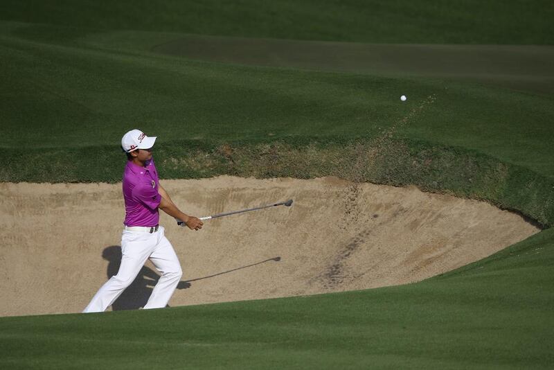Jazz Janewattananond of Thailand in action during the final round of the Dubai Open at The Els Club Dubai on December 21, 2014 in Dubai, United Arab Emirates.  (Photo by Francois Nel/Getty Images)