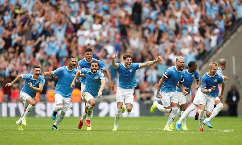 City players celebrate after Jesus scores. Reuters