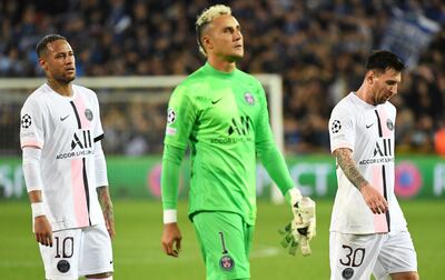 PSG's Lionel Messi, Neymar and Keylor Navas look dejected after the match against Club Brugge. Reuters