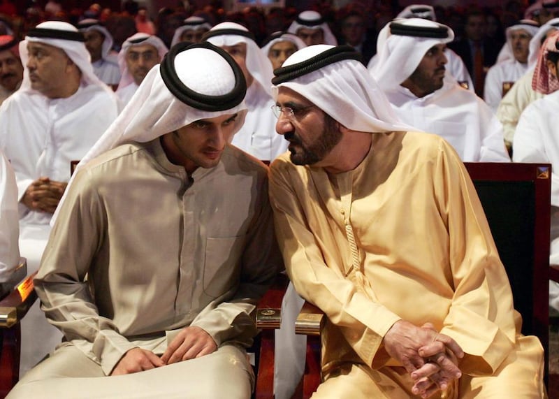 Sheikh Rashid bin Mohammed with Sheikh Mohammed bin Rashid, Vice President and Ruler of Dubai, during a conference in Dubai in 2007.  Ali Haider / EPA