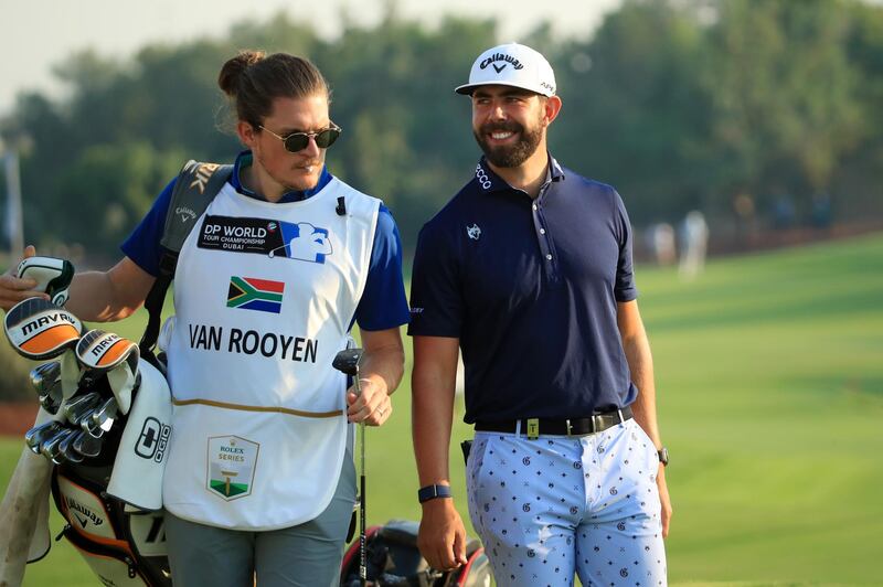 Erik Van Rooyen of South Africa and caddy Alex Gaugert on the 18th green. Getty