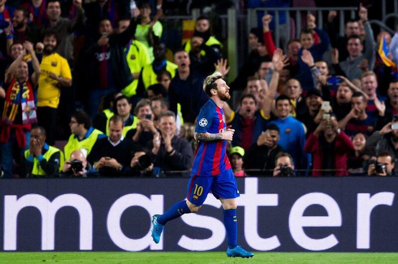 Lionel Messi of Barcelona celebrates after scoring his team’s second goal. Alex Caparros / Getty Images