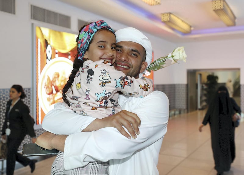 Abu Dhabi, United Arab Emirates - August 15, 2019: The return of the Hajj pilgrims from the Kingdom of Saudi Arabia. The pilgrims will be returning following the Eid Al Adha holiday. Thursday the 15th of August 2019. Abu Dhabi International Airport, Abu Dhabi. Chris Whiteoak / The National