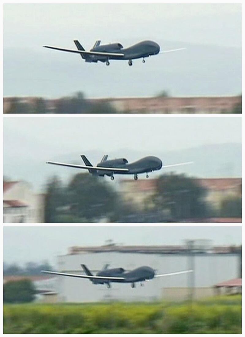 FILE PHOTO: This combination photo shows a U.S. military Global Hawk drone taking off from Sigonella NATO Airbase in the southern Italian island of Sicily March 20, 2011, in this still image taken from video. REUTERS/REUTERS TV/File Photo