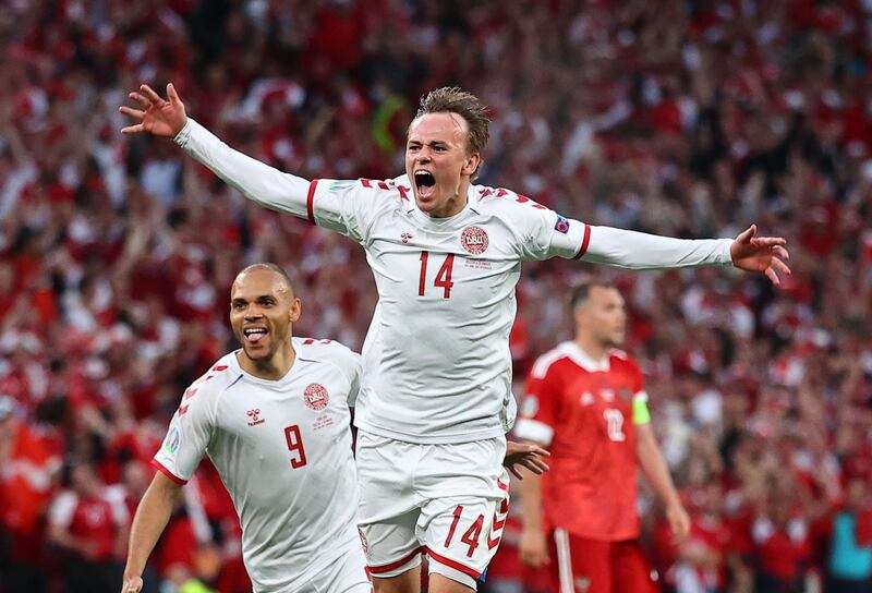 Denmark's Mikkel Damsgaard and Martin Braithwaite celebrate. Reuters