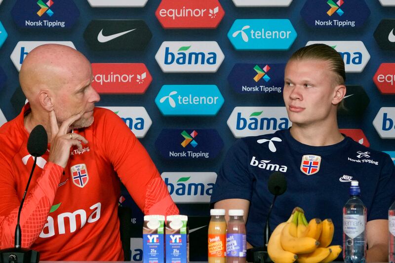 Norway coach Stale Solbakken and Erling Haaland address a press conference prior to a training session with the national team at Ullevaal Stadium in Oslo on May 30, 2022.AFP