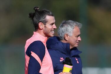 Gareth Bale with Tottenham manager Jose Mourinho during training. Getty