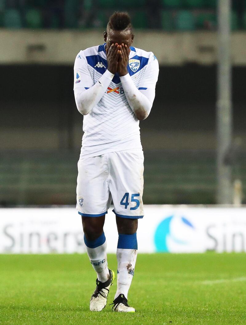 Brescia's Mario Balotelli reacts after suffering racist chants from Verona supporters. EPA