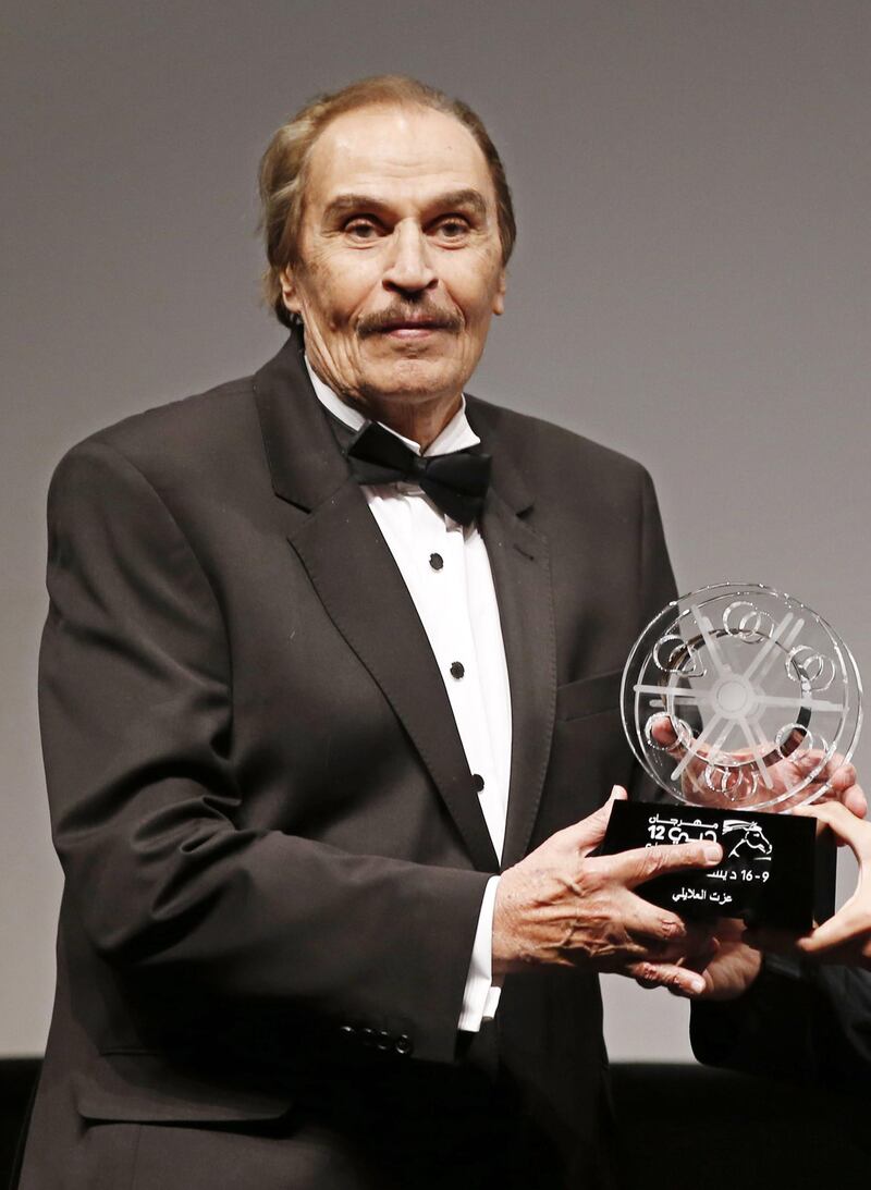 epa08988444 (FILE) - Egyptian actor Ezzat El Alaili receives a Lifetime Achievement Award during the opening ceremony of the 12th Dubai International Film Festival (DIFF) 2015 in Dubai, United Arab Emirates, 09 December 2015 (reissued 05 February 2021). El Alaili died in Cairo, Egypt, on 05 February 2021 at the age of 86.  EPA/ALI HAIDER