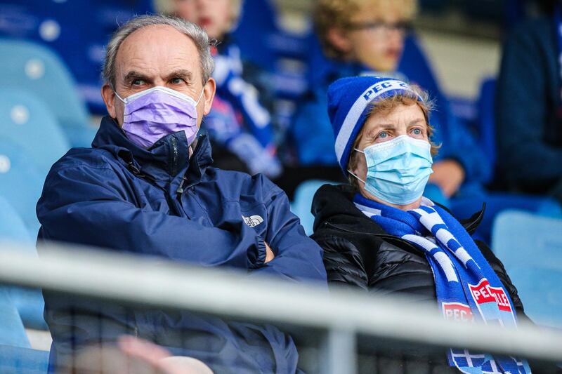 Supporters of PEC Zwolle, wearing face masks, sit prior to the Dutch Eredivisie match between PEC Zwolle and Feyenoord Rotterdam at the MAC3Park stadium on September 12, 2020, in Zwolle, the Netherlands. Netherlands OUT
 / AFP / ANP / Pieter Stam de Jonge
