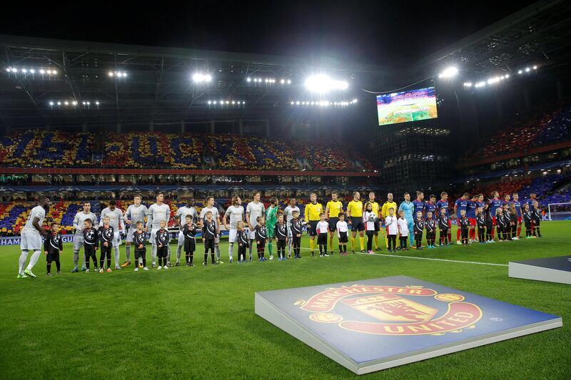 CSKA Moscow and Manchester United players line up before the match. Maxim Shemetov / Reuters