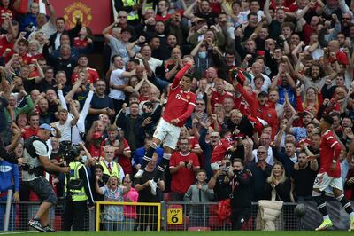 Manchester United's Cristiano Ronaldo celebrates after scoring his second goal against Newcastle on his return to Old Trafford on September 11, 2021. AP
