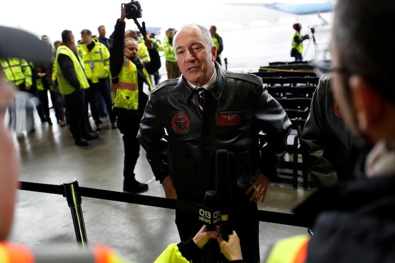 Test Pilot Van Chaney talks with reporters after flying a Boeing 777X in its first test flight at the company's facility in Seattle. Reuters