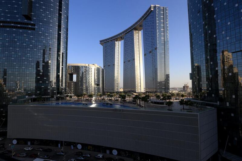 The Gate Towers have recently opened in the Shams area of Reem Island. Average apartment rents in Shams rose 9 per cent during 2013. Average rental rates at the end of the year for one-bedroom apartments were between 100,000-115,000, two-bed 135,000-160,000 and three-bed 155,000-187,000.  Ravindranath K / The National
