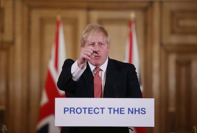 LONDON, ENGLAND - MARCH 22: British Prime Minister Boris Johnson gives his daily COVID 19 press briefing at Downing Street on March 22, 2020 in London, England. Coronavirus (COVID-19) pandemic has spread to at least 182 countries, claiming over 10,000 lives and infecting hundreds of thousands more. (Photo by Ian Vogler-WPA Pool/Getty Images)