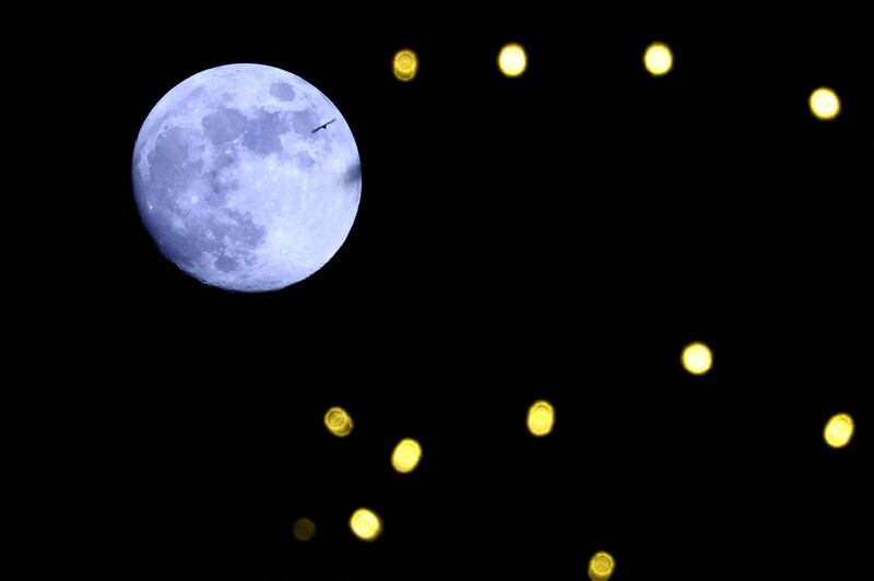 A suitably icy-looking Cold Moon rises over Tirana, Albania. Reuters