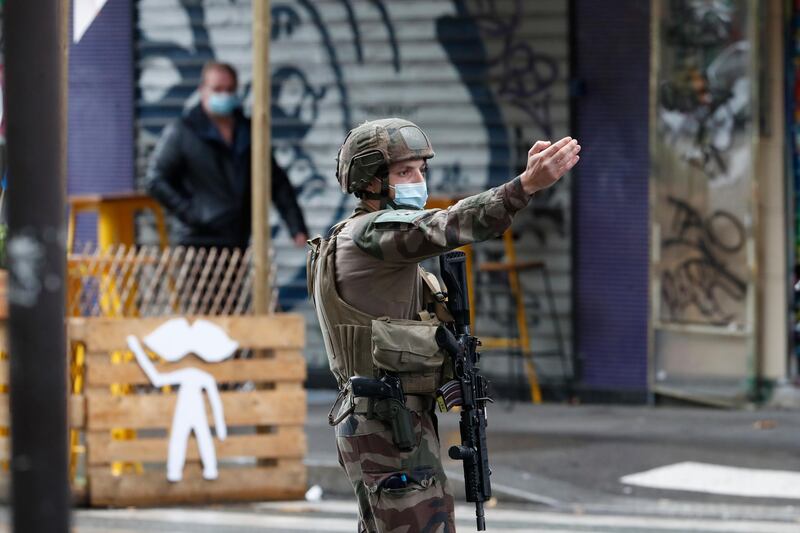 A French soldier in the cordoned off the area. AP Photo