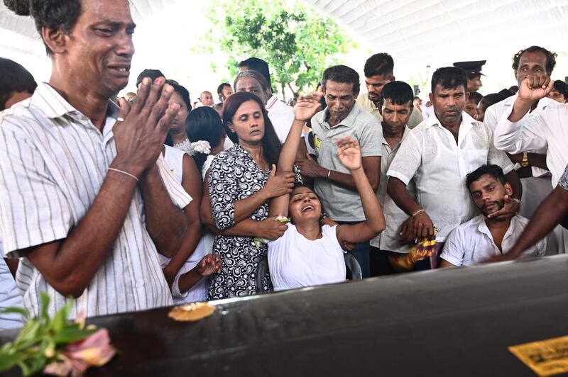 Relatives mourn. AFP