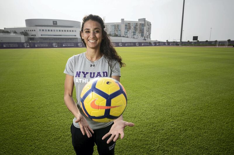 ABU DHABI, UNITED ARAB EMIRATES. 17 DECEMBER 2019. Lyne Ismailis, Head Coach of the NYU Abu Dhabi women’s football team. She works for the Department of Athletics as a program coordinator, and has had a history in working for different sporting venues and events around Abu Dhabi. She runs a programme to encourage and develop adult female football, something that wasn't available in Abu Dhabi before. (Photo: Antonie Robertson/The National) Journalist: Gillian Duncan. Section: National.
