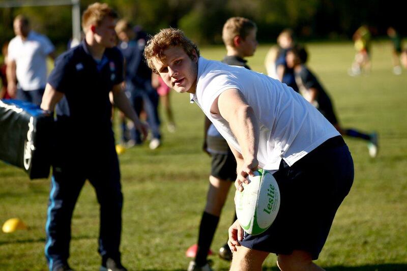 Joe Launchbury of England at a rugby youth clinic in Auckland, New Zealand on May 31, 2014. Phil Walter / Getty Images 