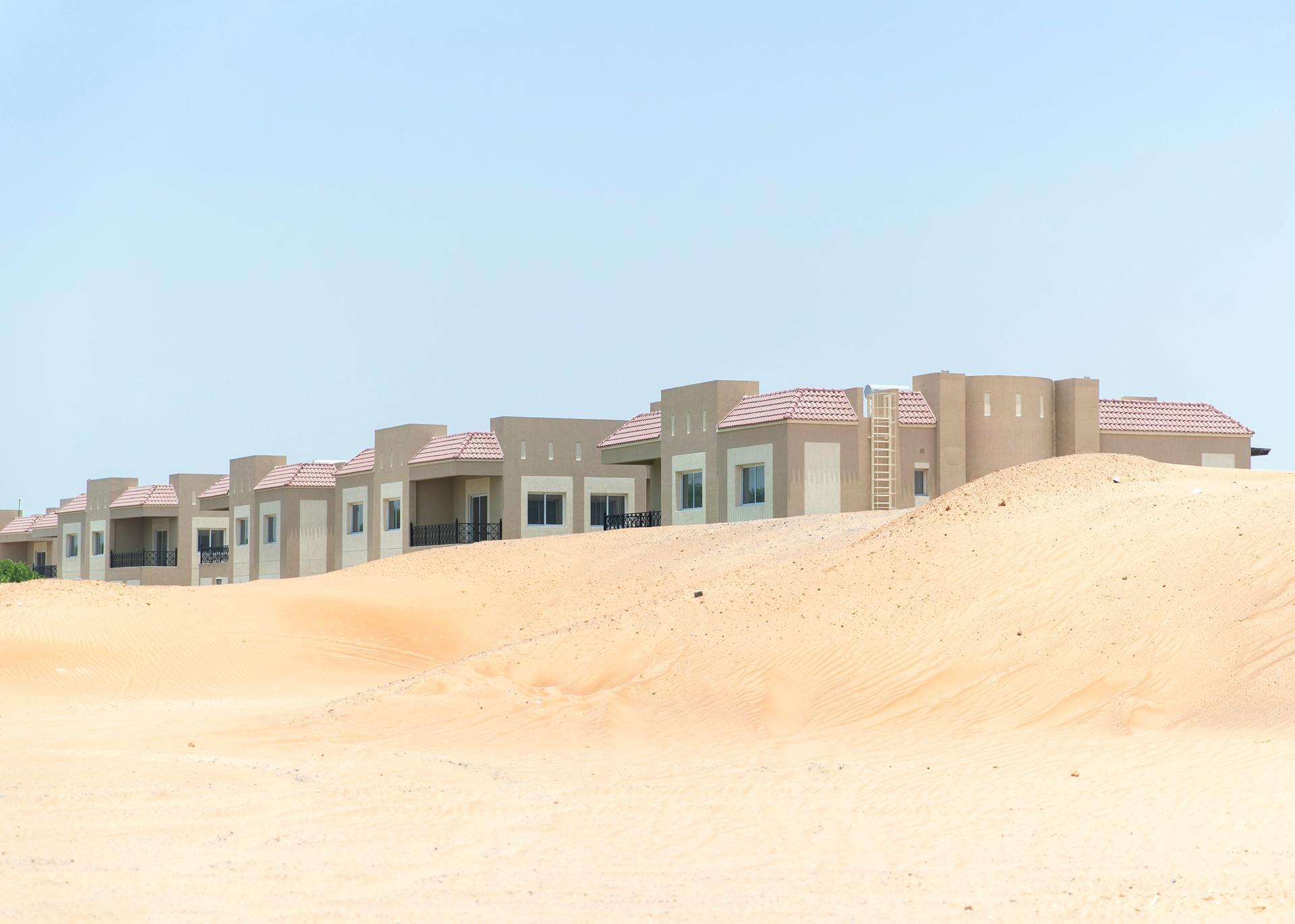 DUBAI, UNITED ARAB EMIRATES - JULY 15 2019.

Sand mounds build up by the villas at Living Legends.

Some residents and investors of Living Legends have paid Dh6m for villas, and pay Dh25,000 a year in service charges but the development still looks like a construction site, with an unfinished golf course, roads, open sewer works near the school, poor lighting and no desert boundary meaning dangerous snakes and animals are regularly getting into the gardens and villas. 

(Photo by Reem Mohammed/The National)

Reporter: NICK WEBSTER
Section: NA