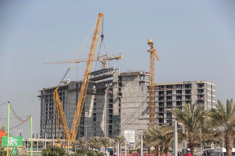 DUBAI, UNITED ARAB EMIRATES. 18 JANUARY 2021. A first for Ras Al Khaimah, an engineering marvel and a milestone in the construction of the Mövenpick Resort Al Marjan Island as a structual bridge is put in place between the hotel structures. (Photo: Antonie Robertson/The National) Journalist: Kelly Clarke. Section: National.