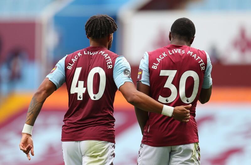 Aston Villa's Tyrone Mings and Kortney Hause with messages in support of the Black Lives Matter campaign. Reuters