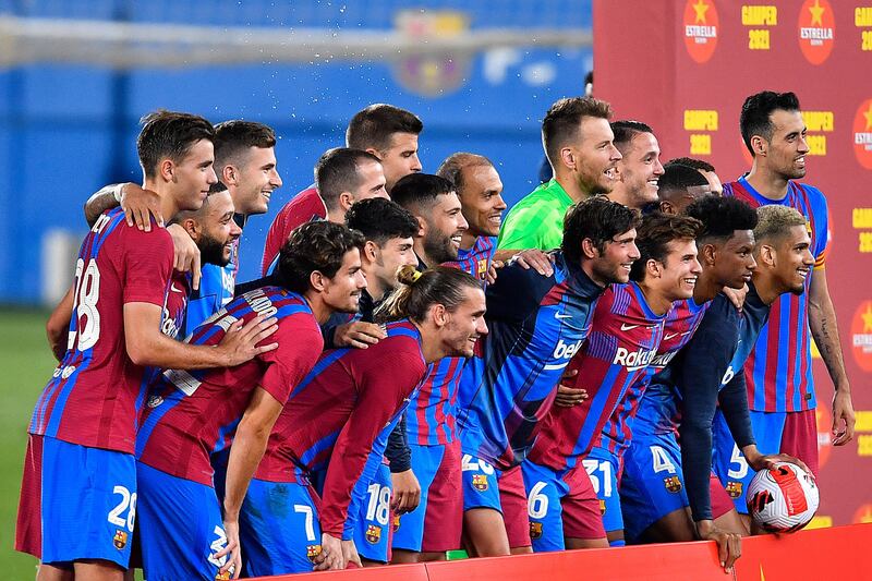Barcelona's players celebrate after winning the 56th Joan Gamper Trophy friendly.