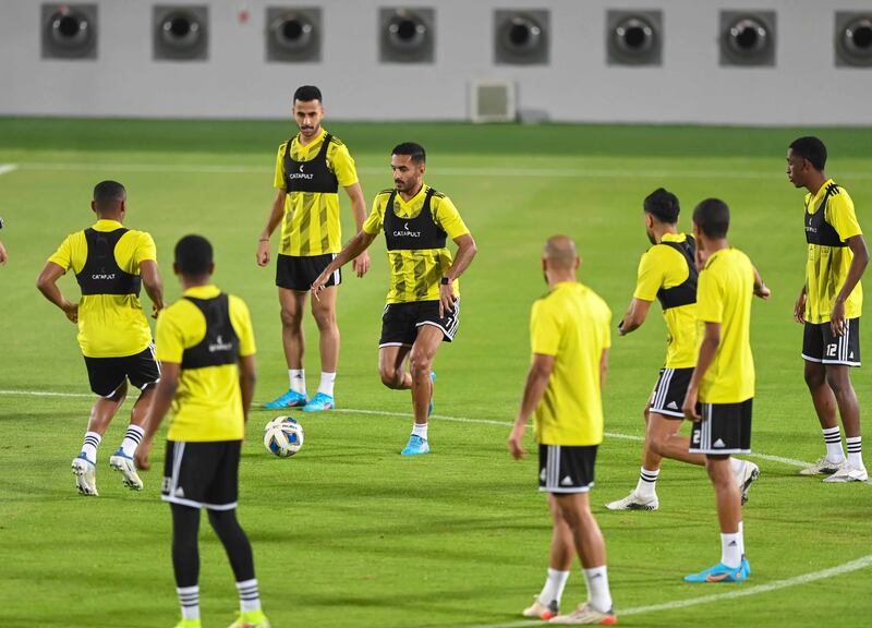 The UAE football team train at the Abdullah bin Khalifa Stadium in Doha ahead of their 2022 World Cup play-off against Australia on Tuesday. Photo: UAE FA