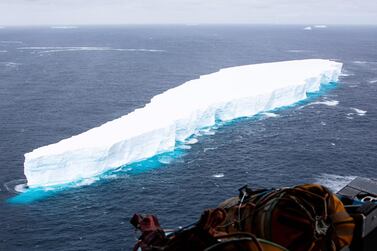 A picture provided by the British Ministry of Defence (MoD) and taken from an A400M Atlas Royal Air Force (RAF) aircraft shows the first photographic evidence of one of the largest recorded icebergs floating near the island of South Georgia, South Atlantic to where it has transited from Antarctica. EPA