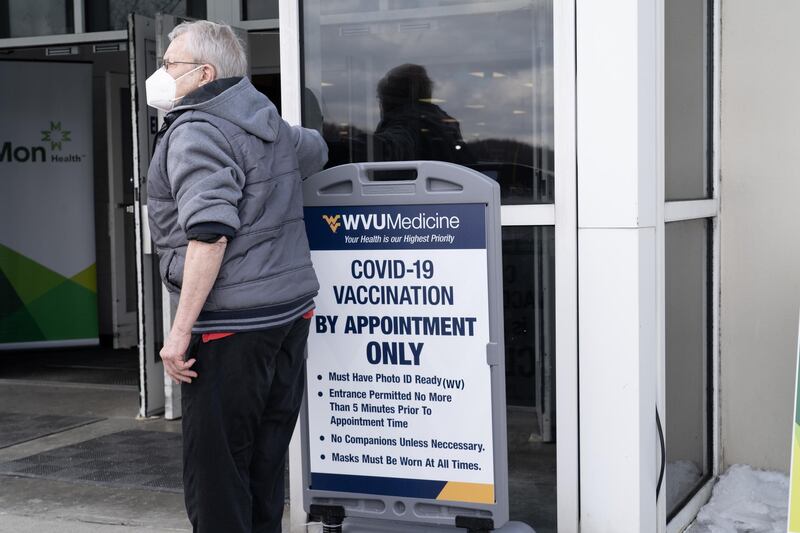 A West Virginian waits outside Covid-19 vaccine clinic near Morgantown, West Virginia. Willy Lowry / The National