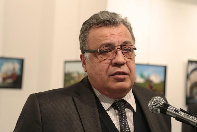 Russia’s ambassador to Turkey Andrey Karlov speaks at a gallery in Ankara on December 19, 2016, where a gunman opened fire and killed him. Burhan Ozbilici / AP Photo