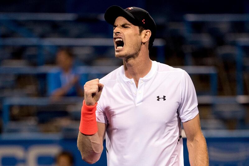 Andy Murray, of Britain, reacts after winning a point against Marius Copil, of Romania, during the Citi Open tennis tournament in Washington, Friday, Aug. 3, 2018. Murray won the match 6-7 (5), 3-6, 7-6 (4). (AP Photo/Andrew Harnik)