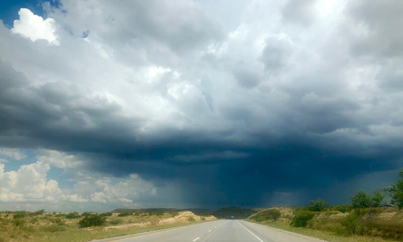 Though Texas has mountain ranges throughout the state, the 10 freeway and roads in and out of Van Horn are known for its wide expanses, perfect for launching rockets. Holly Aguirre / The National