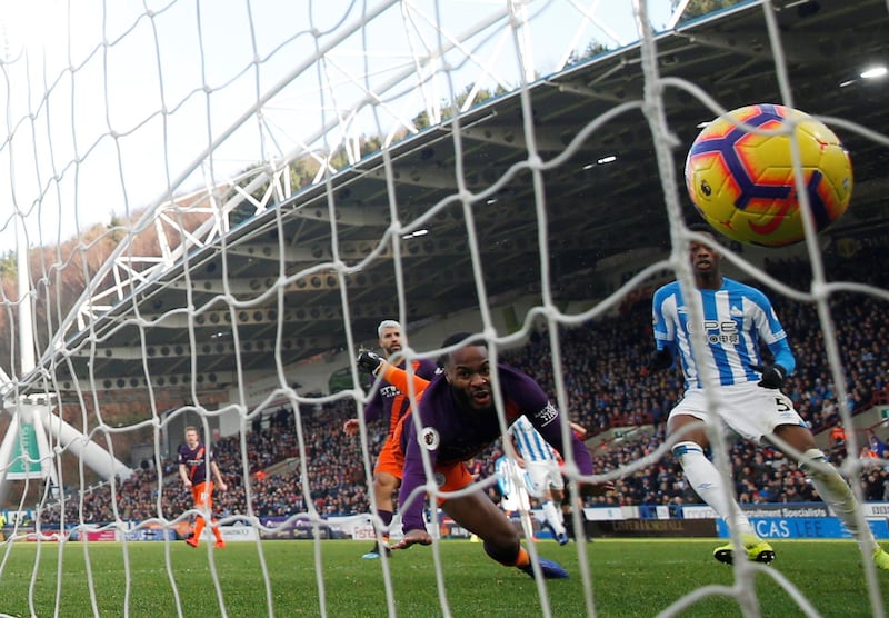 Soccer Football - Premier League - Huddersfield Town v Manchester City - John Smith's Stadium, Huddersfield, Britain - January 20, 2019  Manchester City's Raheem Sterling scores their second goal   Action Images via Reuters/Carl Recine  EDITORIAL USE ONLY. No use with unauthorized audio, video, data, fixture lists, club/league logos or "live" services. Online in-match use limited to 75 images, no video emulation. No use in betting, games or single club/league/player publications.  Please contact your account representative for further details.