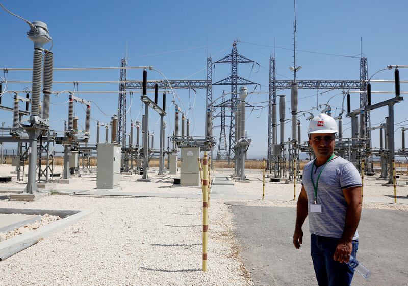 An Israeli engineer stands in the new electrical substation near the West Bank city of Jenin on July 10, 2017. Abed Omar Qusini / Reuters