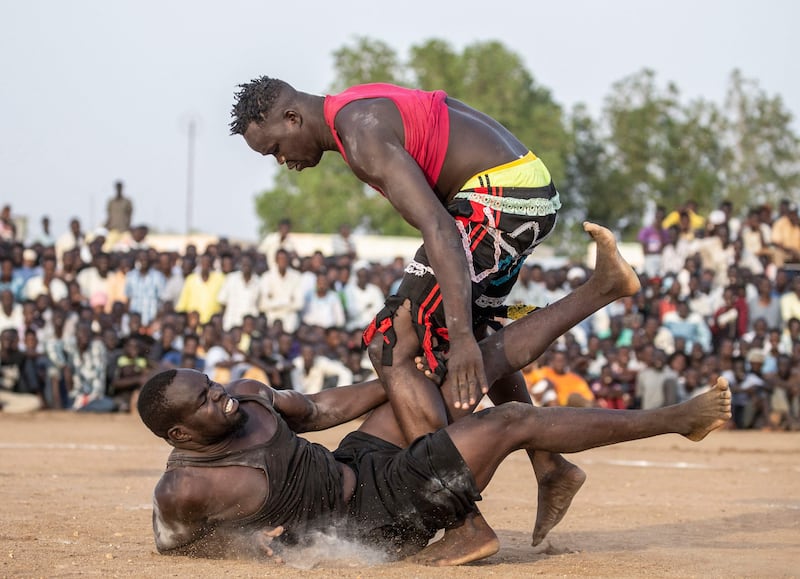 Wrestlers compete during a traditional Nuba wrestling competition in Sudan's capital Khartoum.