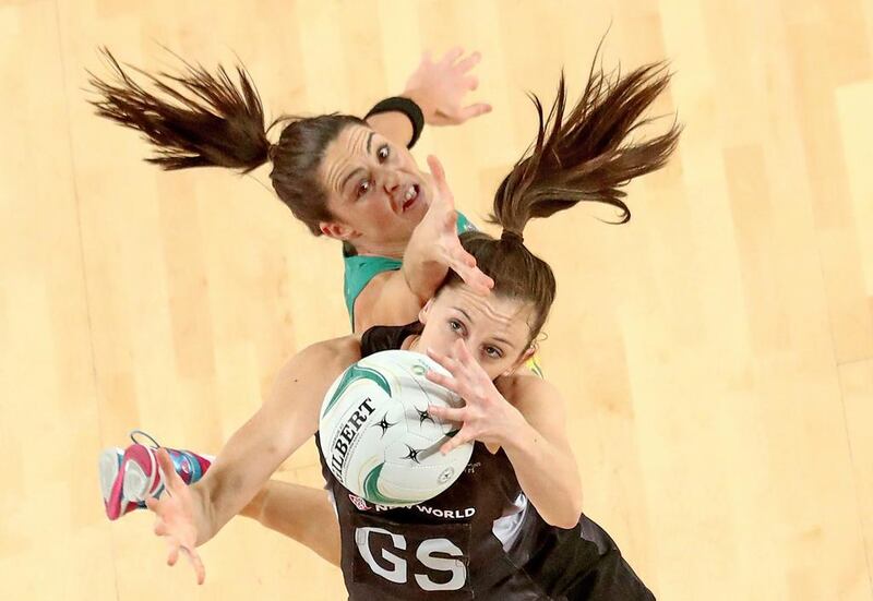 Bailey Mes of the Silver Ferns and Sharni Layton of the Diamonds compete for the ball during the International Test match between the Australian Diamonds and the New Zealand Silver Ferns at Margaret Court Arena in Melbourne, Australia. Scott Barbour / Getty Images