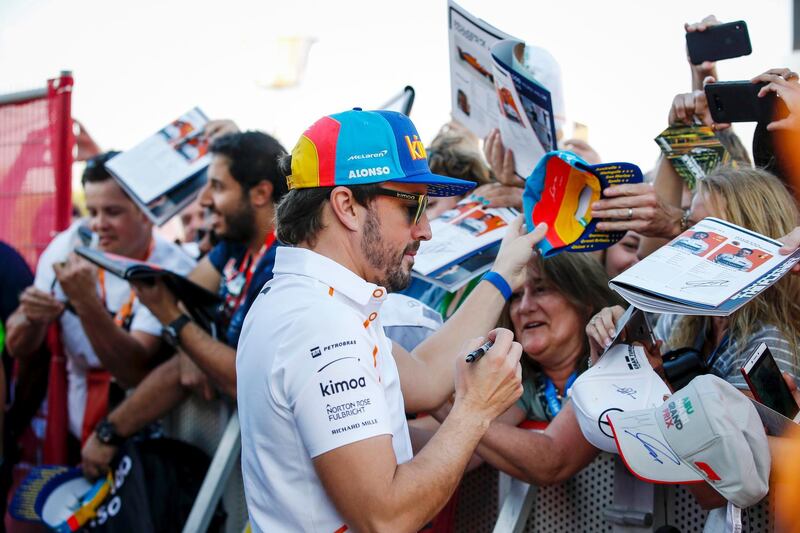 Fernando Alonso greets his fans during an exclusive autograph signing session at Yas Marina Circuit. Courtesy Yas Marina Circuit