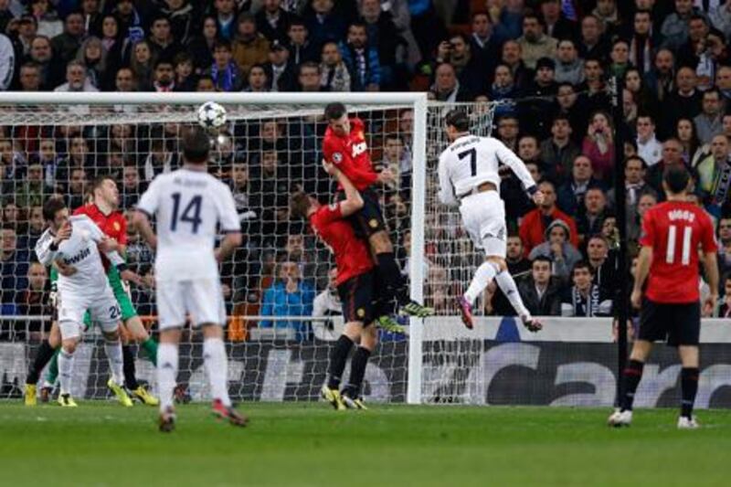 Cristiano Ronaldo heads home an equaliser for Real Madrid against Manchester United in the Champions League at Old Trafford in 2013. AFP
