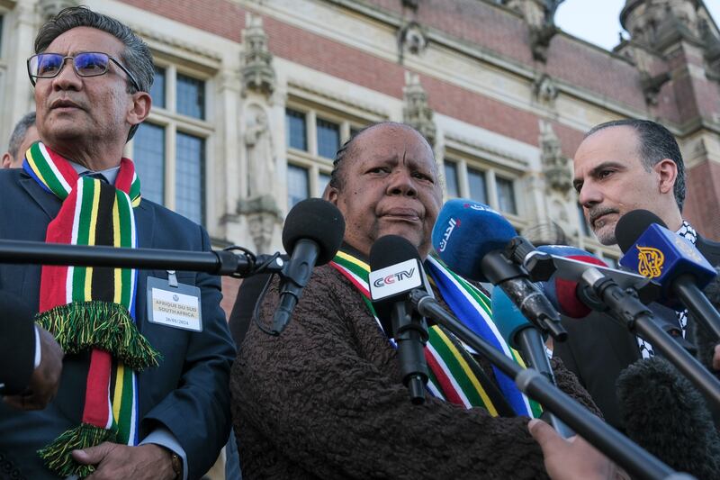 South Africa's Foreign Minister Naledi Pandor, centre, addresses reporters after the court session. AP