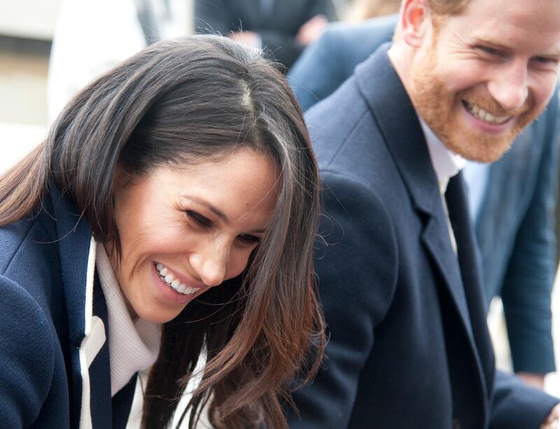 FILE - In this file photo dated Thursday March 8, 2018, Britain's Prince Harry and his fiancee Meghan Markle arrive for an event for young women, as part of International Women's Day in Birmingham, central England. Kensington Palace said Monday May 14, 2018, that Britainâ€™s Prince Harry and Meghan Markle are requesting â€œunderstanding and respectâ€ for Markleâ€™s father after a celebrity news site reported he would not be coming to the royal wedding to walk his daughter down the aisle. (AP Photo/Rui Vieira, FILE)