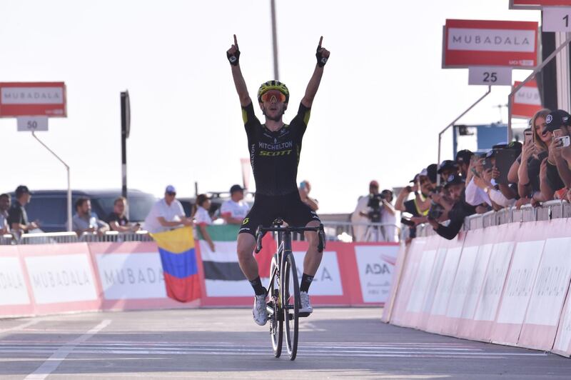 British rider Adam Yates, of team Mitchelton–Scott, celebrates after crossing the finish line to win Stage 3 of the 2020 UAE Tour. AFP
