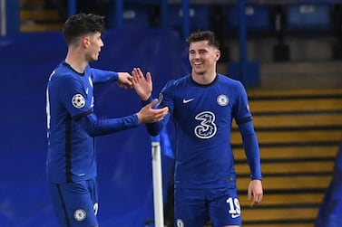 epa09179839 Mason Mount (R) of Chelsea celebrates with teammate Kai Havertz after scoring the 2-0 during the UEFA Champions League semi final, second leg soccer match between Chelsea FC and Real Madrid in London, Britain, 05 May 2021. EPA/Neil Hall