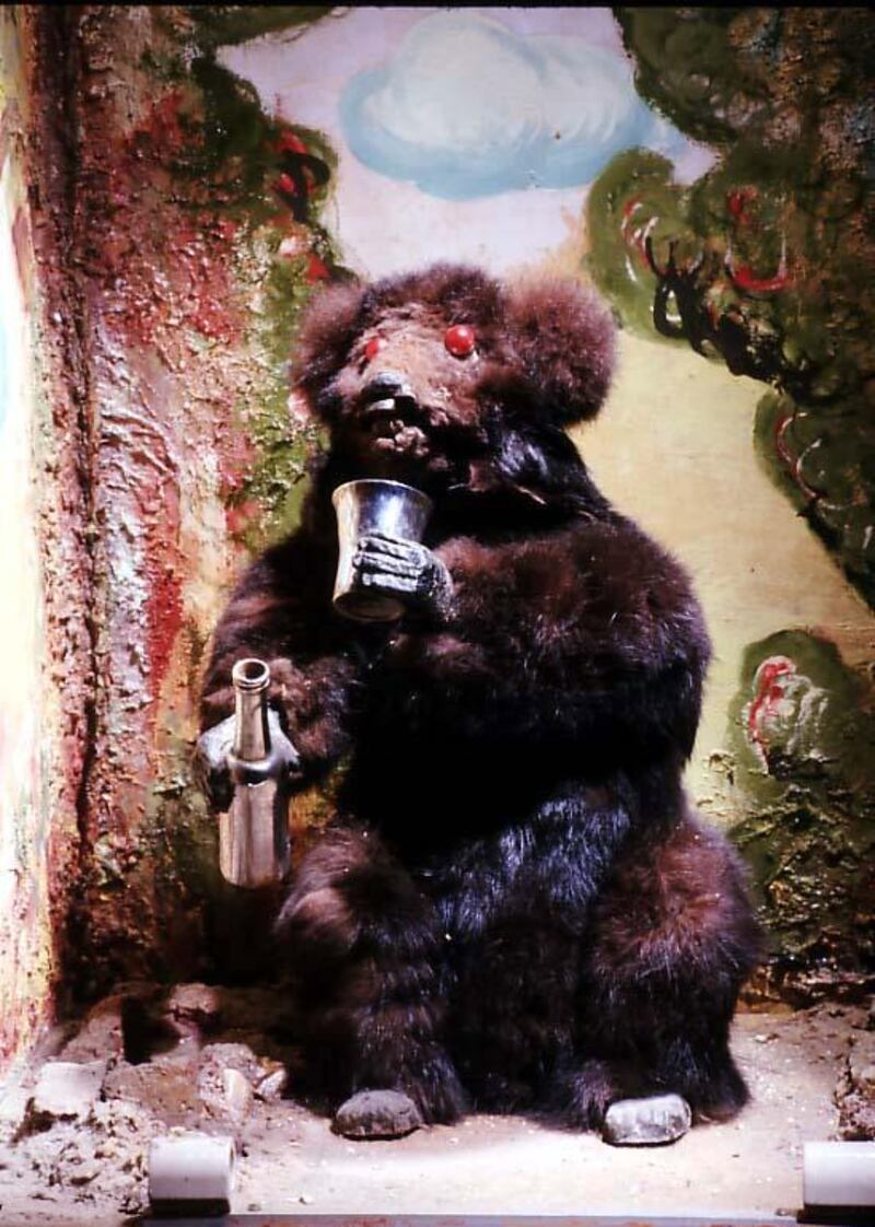 A red-eyed bear casts a soul-staring glance at the Toy Museum of Penshurst Place, a manor and garden house in Kent.  'Feed it a 2 pence piece and it'll pretend to drink from its cup as it stares into your soul,' they write on Twitter. Via @Penshurst Place / Twitter
