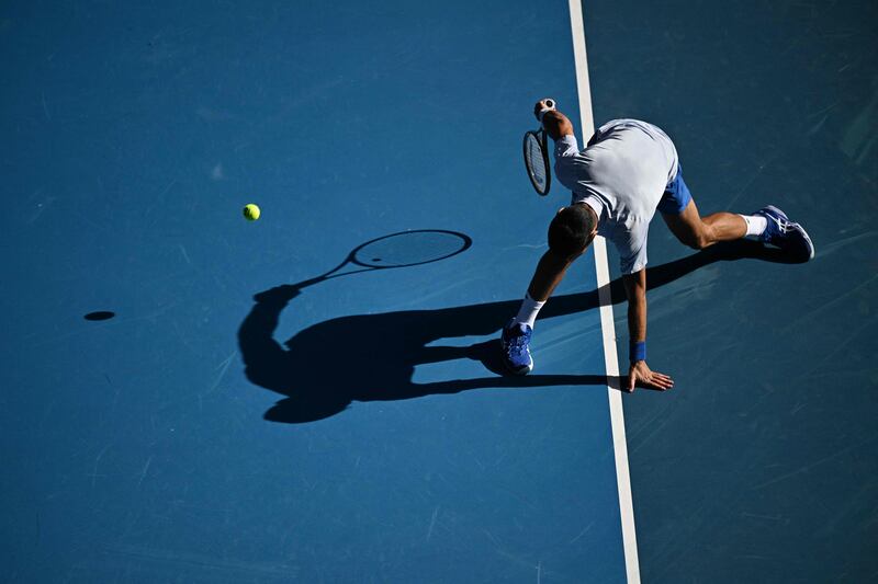 Serbia's Novak Djokovic struggles to return in his defeat by Jannik Sinner. AFP