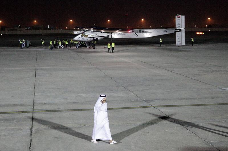 Ground crew prepare the 'Solar Impulse 2' for take-off. Its wingspan of almost 72 metres is only slightly less than that of an Airbus A380, the world's largest airliner.