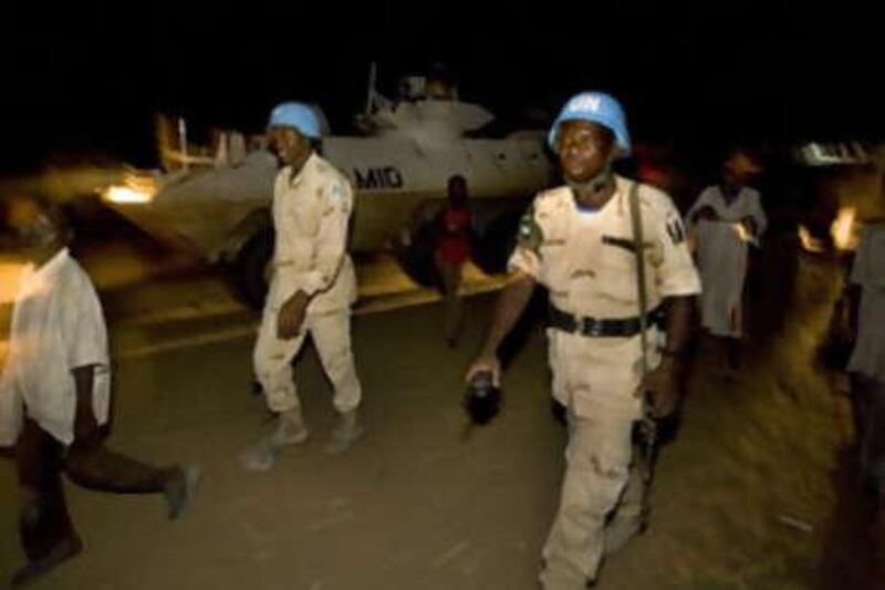 Unamid (United Nations-African Union peacekeeping mission in Darfur) forces on a night patrol in Otach IDP camp in South Darfur.