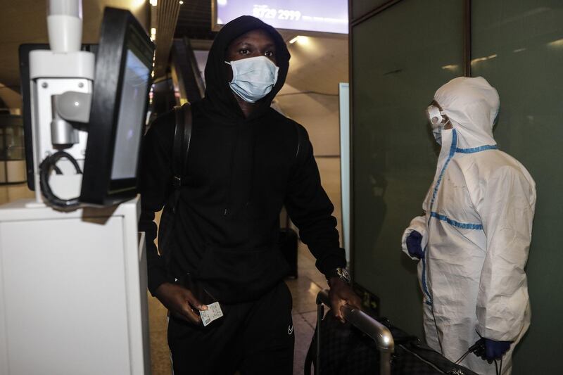 Players of the Wuhan Zall football team arrive at Wuhan railway station in Hubei, China. The  team left Wuhan on January 5, 2020 for a training session in Guangzhou of Guangdong Province. Since then they have spent 104 days training in Malaga, Spain and other cities in Guangdong before finally returning. Getty